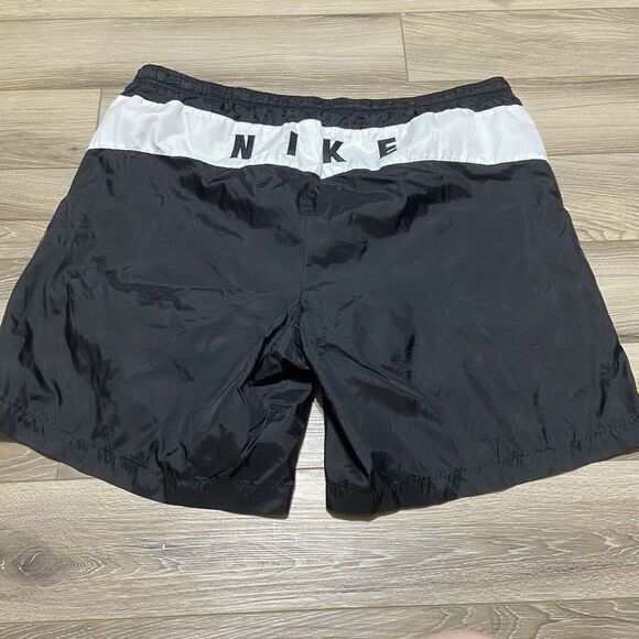 Nike Other - NWOT VTG 90s Nike Spell out Swoosh Shorts Swim Trunks Sewn Logo Lined mesh Black